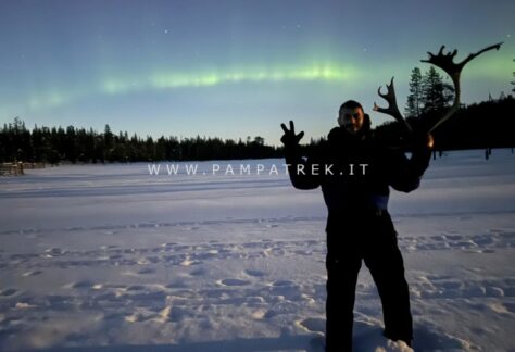 Neve e aurora boreale